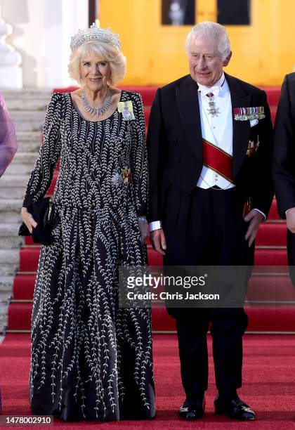 King Charles III and Camilla, Queen Consort pose at The Bellevue Palace ahead of a State Banquet on March 29, 2023 in Berlin, Germany. The King and...