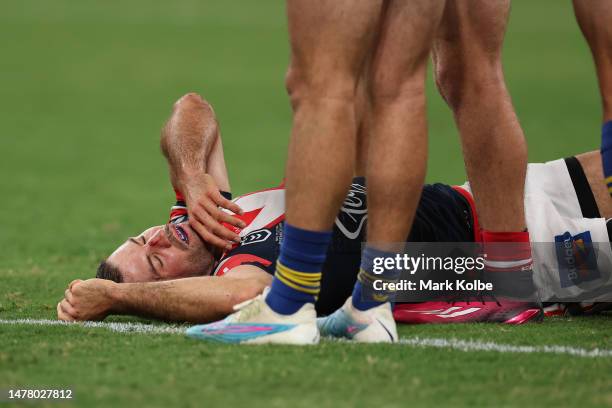 James Tedesco of the Sydney Roosters is given medical assistance during the round five NRL match between the Sydney Roosters and the Parramatta Eels...