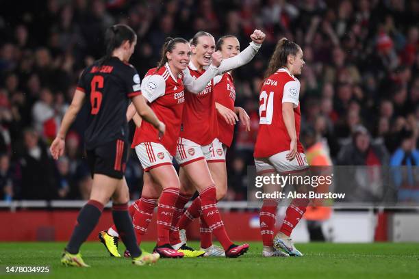 Stina Blackstenius of Arsenal celebrates with teammates Noelle Maritz and Lia Waelti after scoring the team's second goal during the UEFA Women's...