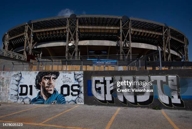 General view of Stadio Diego Armando Maradona behind a Diego Maradona mural outside Stadio Diego Armando Maradona on March 24, 2023 in Naples, Italy.