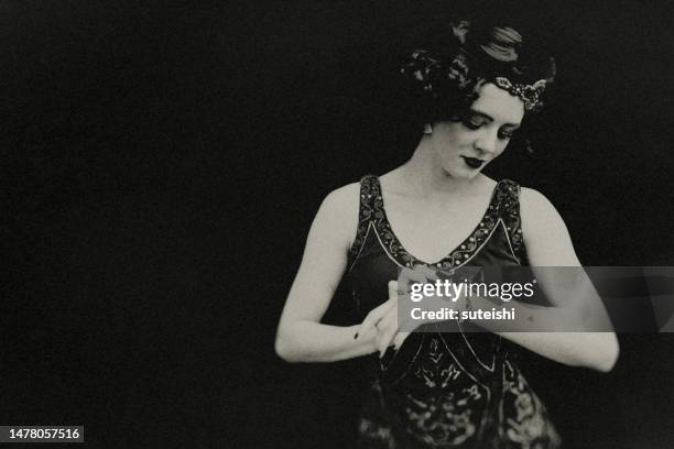 she is waiting for her boyfriend. - speakeasy stock pictures, royalty-free photos & images