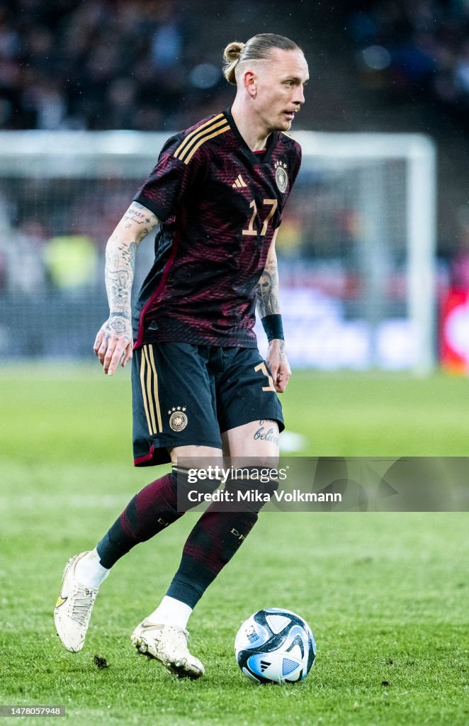 Mwolf Marius Wolf of Germany runs with the ball during an international ...