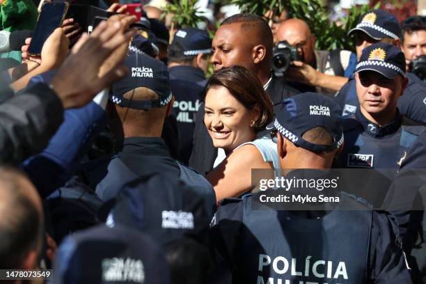 Michelle Bolsonaro receives his husband Jair Bolsonaro on his arrival at the Liberal Party Headquarters after three months of self-imposed exile in...