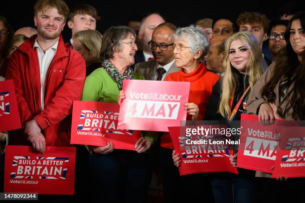 Labour Party supporters hold placards ahead of the launch of Labour's Local Election campaign on March 30, 2023 in Swindon, England. Labour sets out...