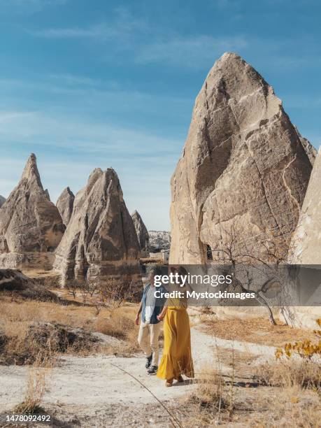 couple travel in turkey and explore cappadocia and the rock formations - göreme national park stock pictures, royalty-free photos & images