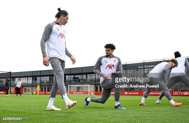 Luis Diaz and Darwin Nunez of Liverpool during a training session at AXA Training Centre on March 30, 2023 in Kirkby, England.