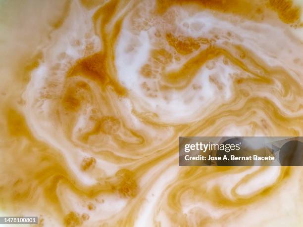 full frame of a freshly brewed cup of latte. - milk full frame stock pictures, royalty-free photos & images