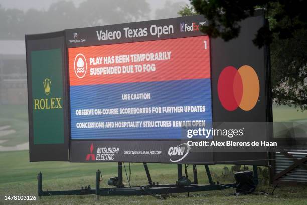 General view of signage informing fans of a weather delay during the first round of the Valero Texas Open at TPC San Antonio on March 30, 2023 in San...