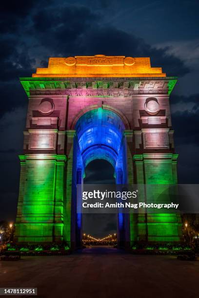 india gate lit with tricolor - indian tricolor stock pictures, royalty-free photos & images