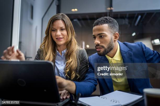 business people using laptop - blue blazer stock pictures, royalty-free photos & images