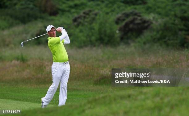 Steven Tiley of Royal Cinque Port plays a shot from the 9th fairway during The Open Championship Local Final Qualifying at Hillside Golf Club on July...