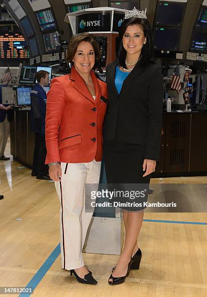 Amy Kule, Executive Producer of Macy's 4th of July Fireworks and Miss America 2012, Laura Kaeppeler ring the closing bell at the New York Stock...