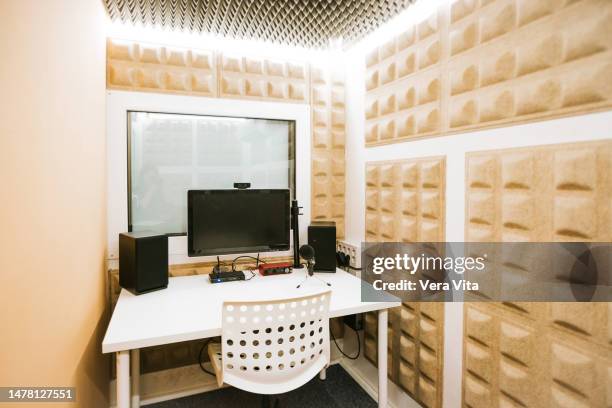 panoramic view of empty professional soundproofing room and audio recorder space - acoustic music stock-fotos und bilder
