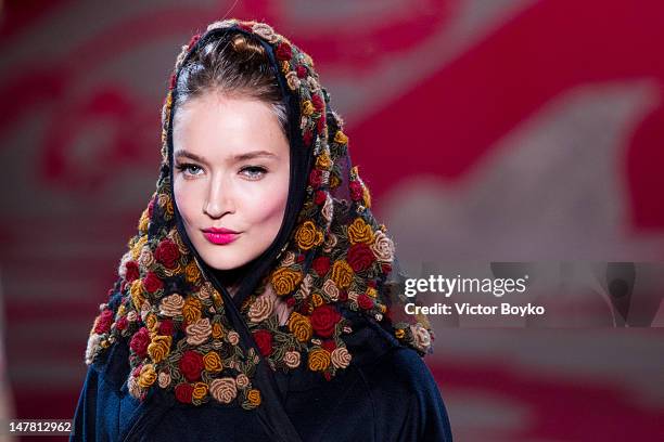 Model walks the runway during the Ulyana Sergeenko Haute-Couture Show as part of Paris Fashion Week Fall / Winter 2013 at Theatre Marigny on July 3,...