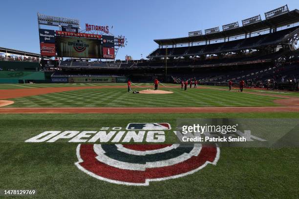 General view as the grounds-crew prepare the infield before the Atlanta Braves playing against the Washington Nationals on Opening Day at Nationals...