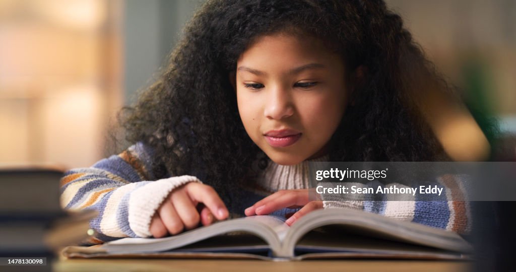 Kid reading book for learning, education and language development, literature or story knowledge. Biracial girl or child with library books or textbook for creative mind, storytelling and studying