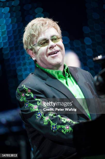 Elton John performs on stage at the Koenig-Pilsner Arena on July 03, 2012 in Oberhausen, Germany.