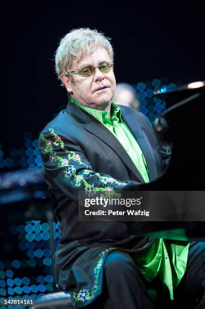 Elton John performs on stage at the Koenig-Pilsner Arena on July 03, 2012 in Oberhausen, Germany.