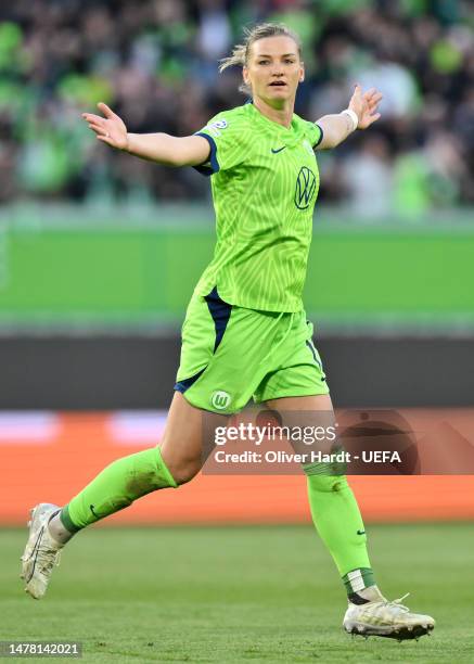Alexandra Popp of VfL Wolfsburg celebrates after scoring the team's first goal during the UEFA Women's Champions League quarter-final 2nd leg match...