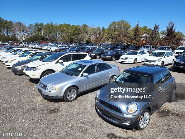 Vehicles up for auction are parked in the impound yard in Suffolk County, New York Vehicles up for auction are parked in the impound yard in Suffolk County, New York