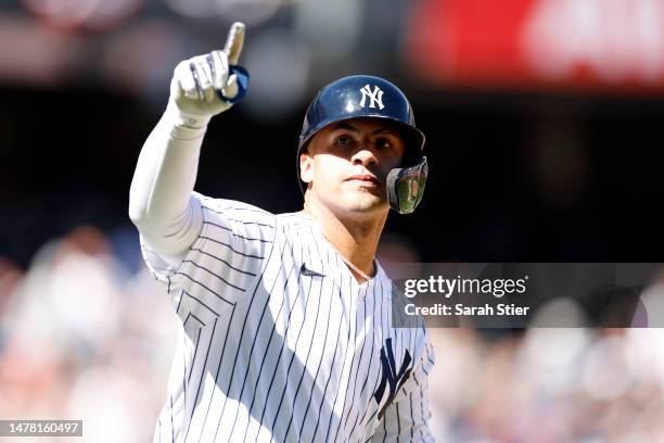 Gleyber Torres of the New York Yankees reacts after hitting a two-run home run during the fourth inning against the San Francisco Giants on Opening...