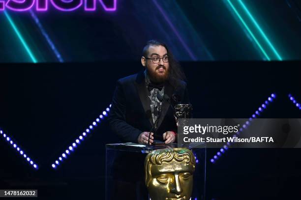 Laurence Phillips, from Poncle Studio, accepts the Game Design Award for 'Vampire Survivors' at the 2023 BAFTA Games Awards, held at Queen Elizabeth...