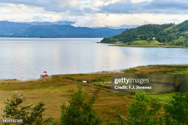 landscape of la cocha lagoon in nariño, colombia - narino stock pictures, royalty-free photos & images