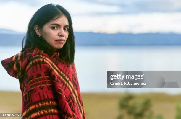 portrait of south american woman in front of la cocha lagoon in colombia - traditional colombian clothing stock pictures, royalty-free photos & images