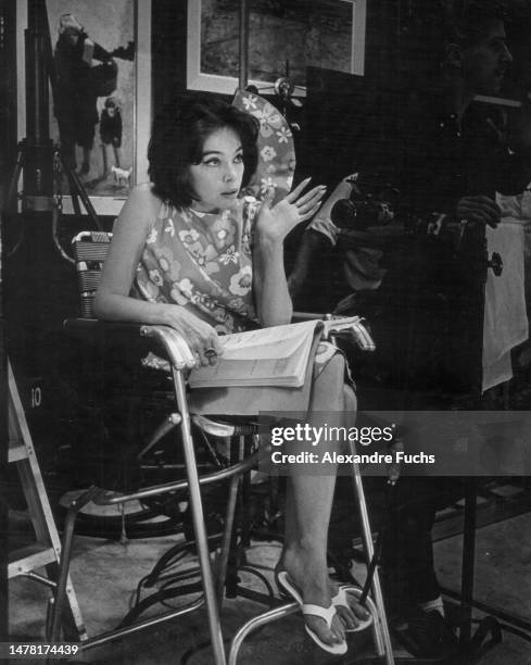 Actress Leslie Caron reading the script while in the set of the film "A Very Special Favor"