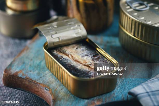 canned fish - sardines in a tin - sardinas stock pictures, royalty-free photos & images