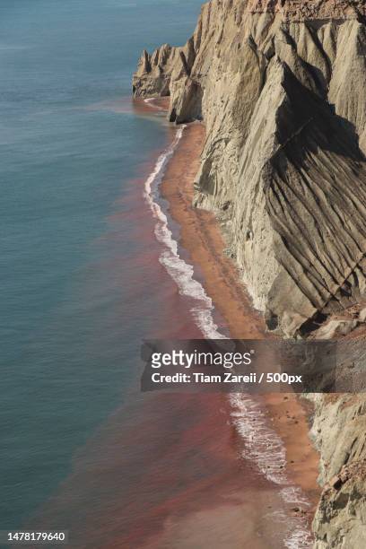high angle view of rocks on beach,hormuz island,iran - hormuz island stock pictures, royalty-free photos & images