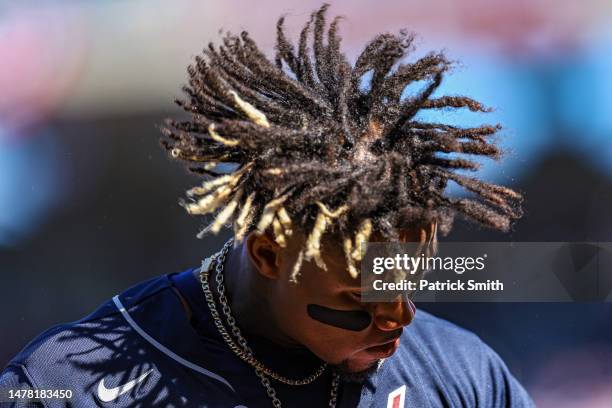 Ronald Acuna Jr. #13 of the Atlanta Braves shakes his head after taking off his hat as he walks to the dugout against the Washington Nationals during...