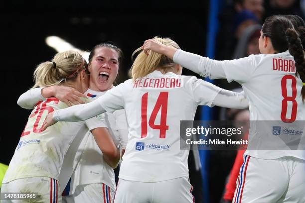 Vanessa Gilles of Olympique Lyonnais celebrates with team mates after scoring the team's first goal during the UEFA Women's Champions League...