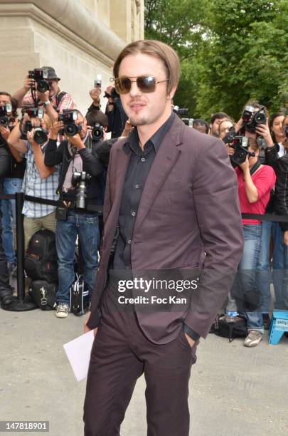 Michael Pitt attends the Chanel show during Paris Fashion Week Haute Couture F/W 2012/13 at Le Grand Palais on July 3, 2012 in Paris, France.