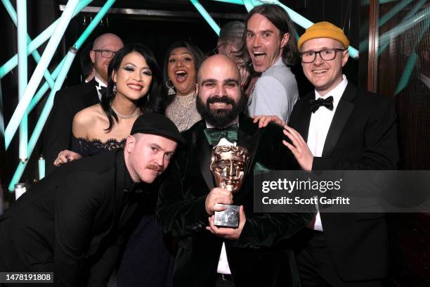 Andreas Yiannikaris , Drew Jones , Andrew Fray and other Development Team members from Roll7/Private Division, backstage with the British Game Award...