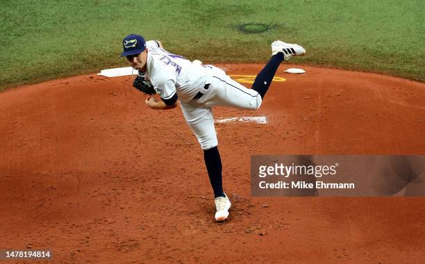 Shane McClanahan of the Tampa Bay Rays pitches during a game against the Detroit Tigers on Opening Day at Tropicana Field on March 30, 2023 in St...