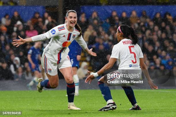 Sara Daebritz of Olympique Lyonnais celebrates with teammate Perle Morroni after scoring the team's second goal during the UEFA Women's Champions...