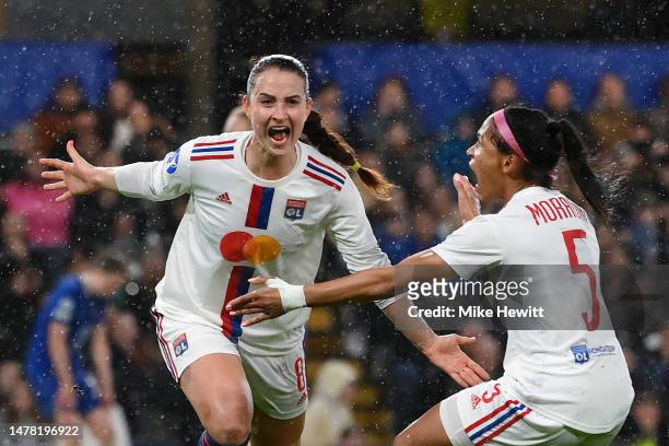 Sara Daebritz of Olympique Lyonnais celebrates with teammate Perle Morroni after scoring the team's second goal during the UEFA Women's Champions...