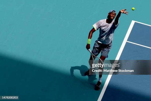 Christopher Eubanks of the United States serves to Daniil Medvedev of Russia during the quarterfinals of the Miami Open at Hard Rock Stadium on March...