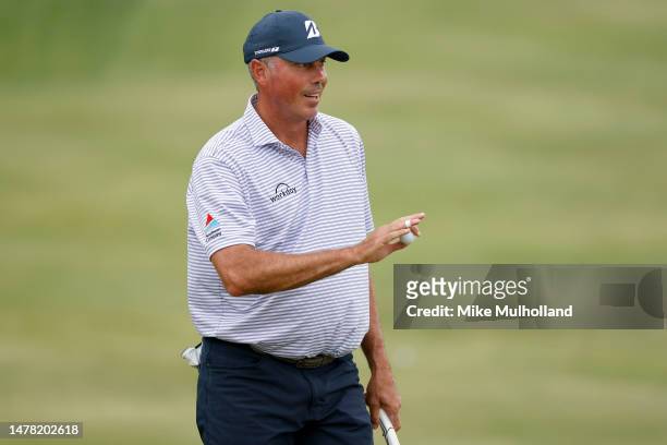 Matt Kuchar of the United States reacts after making birdie on the eighth green during the first round of the Valero Texas Open at TPC San Antonio on...