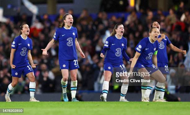 Chelsea players celebrate in the penalty shootout during the UEFA Women's Champions League quarter-final 2nd leg match between Chelsea FC and...