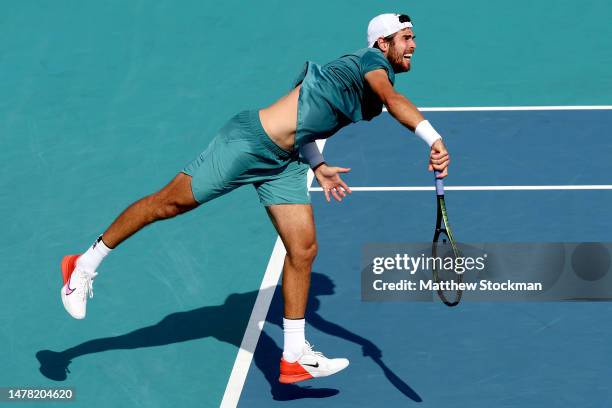 Karen Khachanov of Russia serves to Francisco Cerundolo of Argentina serves to during the quarterfinals of the Miami Open at Hard Rock Stadium on...