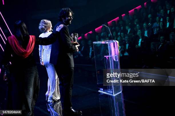 Team member from Poncle Studio, accepts the Best Game Award for 'Vampire Survivors' at the 2023 BAFTA Games Awards, held at Queen Elizabeth Hall on...