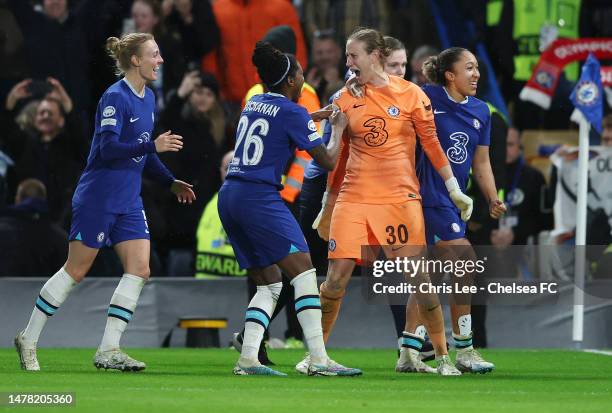 Ann-Katrin Berger of Chelsea celebrates with teammates after them winning the penalty shootout during the UEFA Women's Champions League quarter-final...