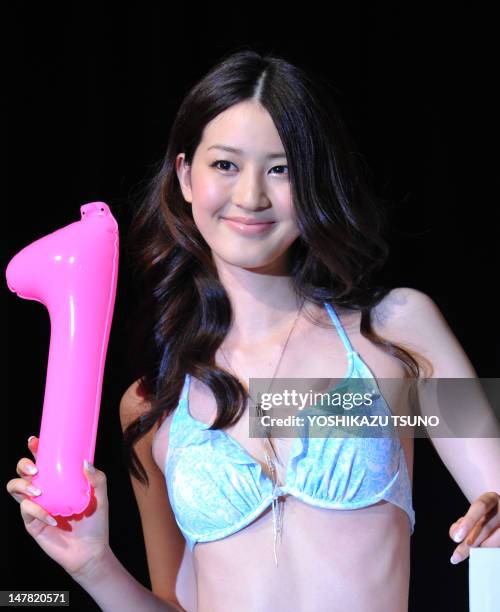 Twenty-year-old model Kaede Aono poses in a swimsuit at the 10th Rayli cover girl contest in Tokyo on July 4, 2012. Aono was selected as the Japanese...