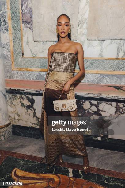 Jourdan Dunn attends a dinner hosted by Olivier Rousteing to mark the opening of Balmain's new London boutique, held at Apollo's Muse on March 30,...