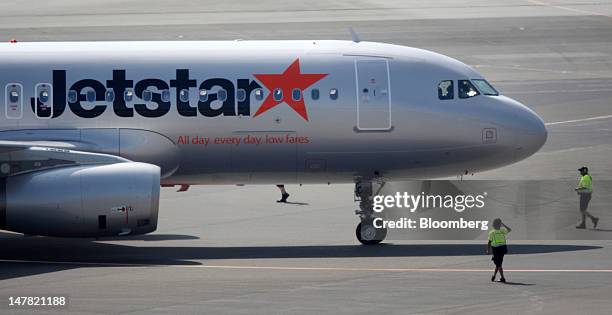 Jetstar Japan Co. Aircraft taxies at Narita Airport in Narita City, Chiba Prefecture, Japan, on Tuesday, July 3, 2012. Jetstar Japan Co., part-owned...