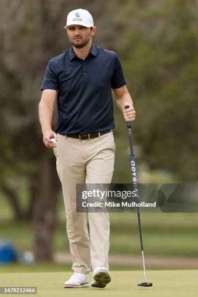 Kyle Stanley of the United States reacts after making birdie on the eighth green during the first round of the Valero Texas Open at TPC San Antonio...