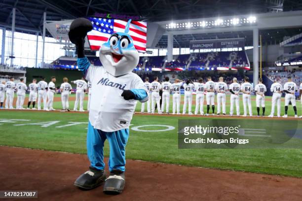 The Miami Marlins mascot reacts after the national anthem prior to a game against the New York Mets on Opening Day at loanDepot park on March 30,...