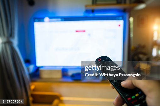 Multimedia video concept on TV set in dark room